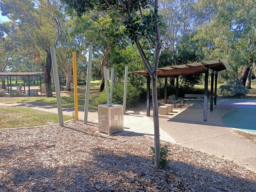 Shaded area with bench seating.
