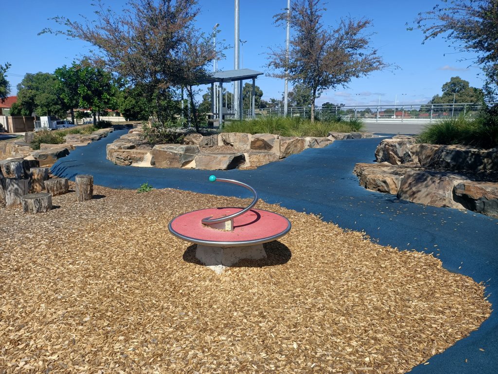Red playground spinner