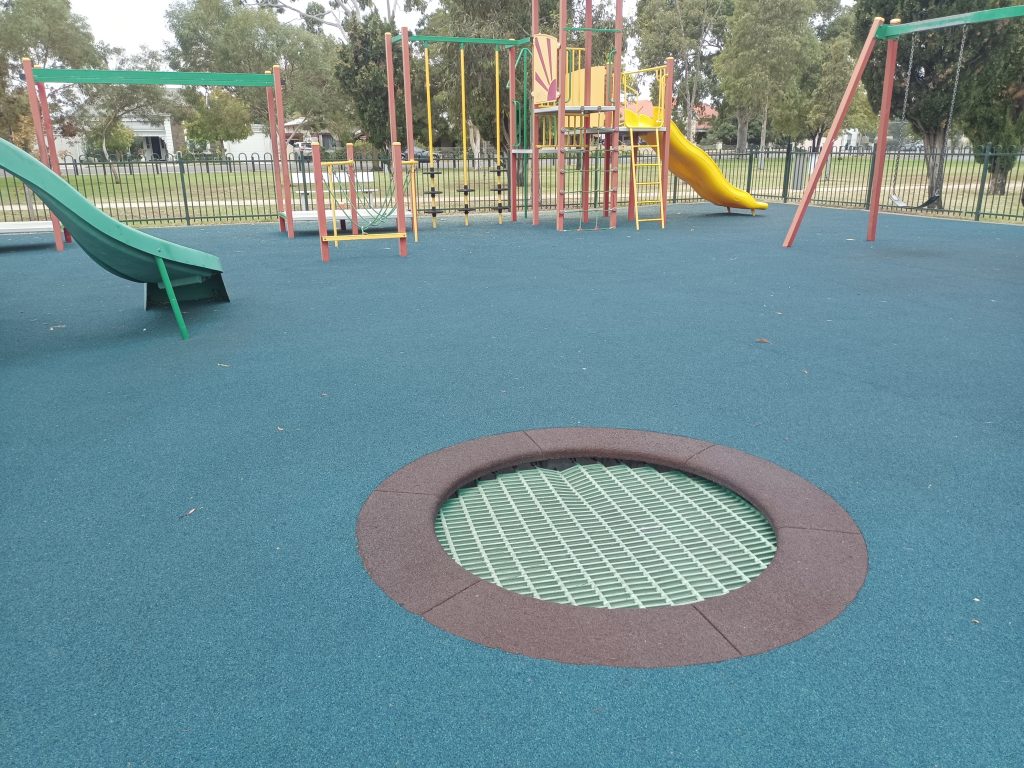 In ground play trampoline