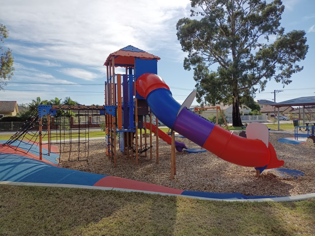 Tubed playground slide