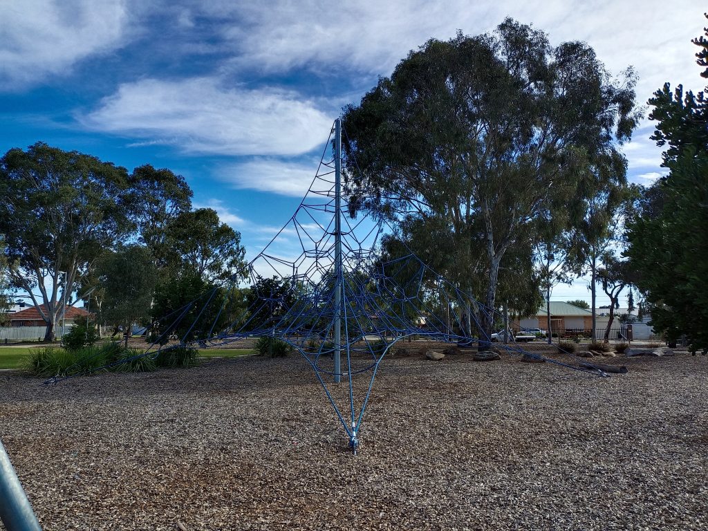 Playground rope pyramid athol park houses behind