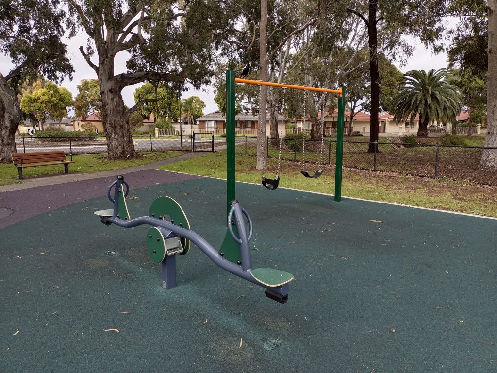 Grey and green see saw